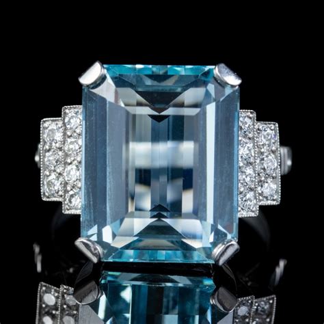 The plaque shape of this ring is a typical art deco design, emblematic of the era in which this piece was made. Art Deco Aquamarine Diamond Ring Platinum 13.17ct Emerald ...