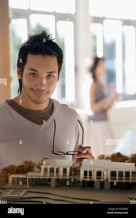 Asian Male Architect Next To Model Stock Photo Alamy