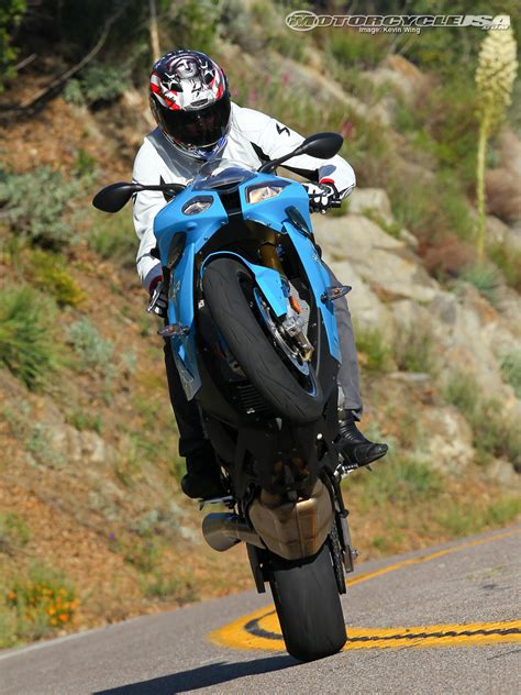 Bmw look is always good and this bike is awesome with black and white combination., it can speed 144 km/h with 30km/l. Best Sportbike 2012: BMW S1000RR - Motorcycle USA