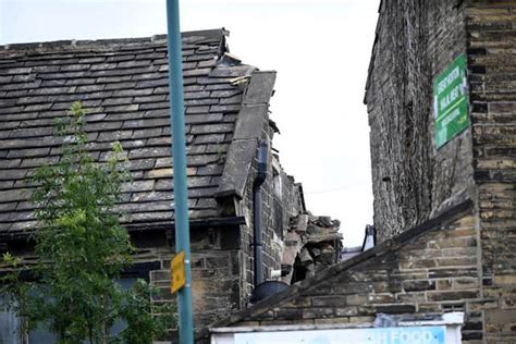 neighbours heard loud bang and screaming as man dies in bradford house roof collapse