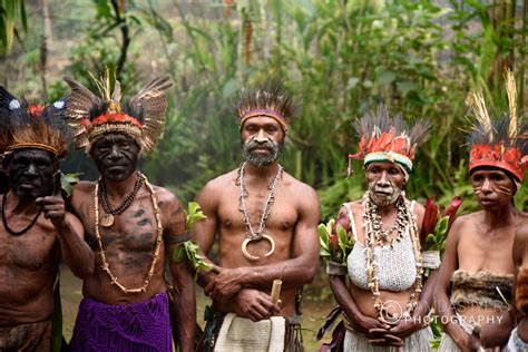 Divided by language, customs, and tradition, some of these communities have engaged in tribal warfare with their neighbors for centuries. Chimbu people of Goraka Highlands, Papua New Guinea ...