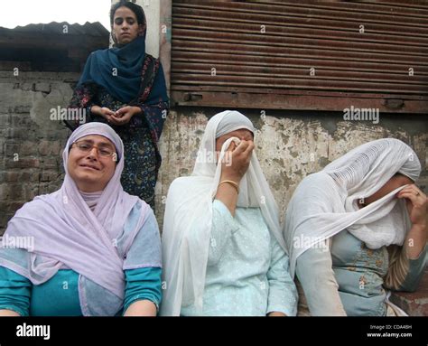 Kashmiri Muslim Women Crying During The Funeral Procession Of Ghulam