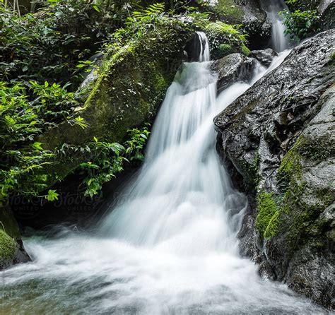 A Misty Waterfall In Thailand By Stocksy Contributor Tim Booth