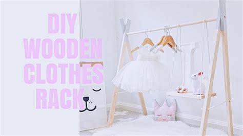 Here's how to make a baby clothes rack to keep all their little items of clothes organized. DIY CUTE BABY GIRL WOODEN CLOTHING RACK WITH SWING SHELVES ...