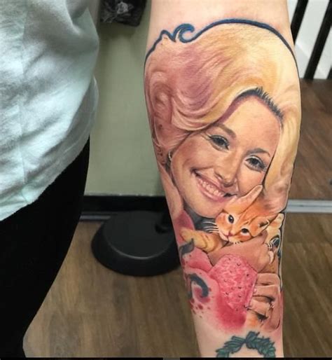 Dolly Parton Tattoos Photos Dolly Parton 73 Admits She Has Several Flower And Butterfly