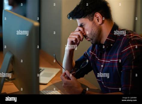 The Stress Of Working Long Hours Cropped Shot Of A Young Businessman