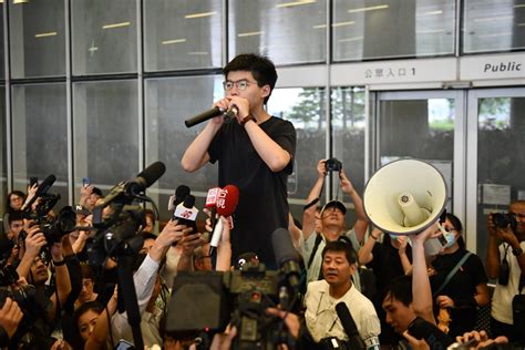 hours after prison release hong kong activist joshua wong joins protest calls for extradition