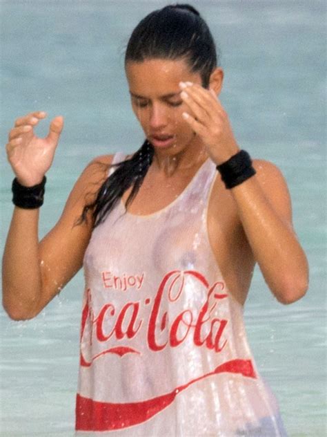 Adriana Lima Braless In Her Wet T Shirt Taxi Driver Movie