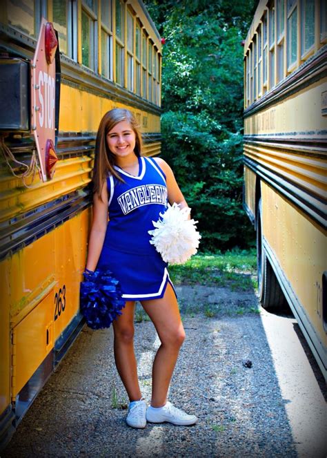 Cheerleader Between Two Buseslove The Depth In This Pic Fashion Cheer Skirts Cheerleading