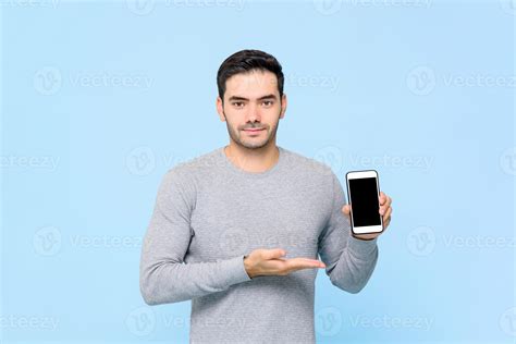 Handsome Caucasian Man Showing Mobile Phone With Empty Screen Isolated