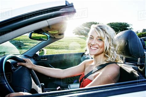 Caucasian Woman Driving Convertible Stock Photo Dissolve