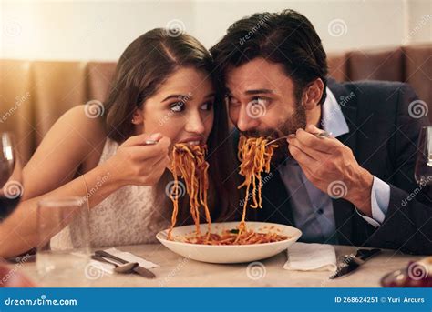 Hungry Restaurant And Couple Eating Spaghetti For Love Crazy Fun And Sharing Plate On