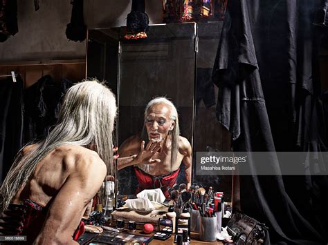 Transvestite Asian Senior Man Making Up Photo Getty Images