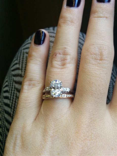 Hilton has an emerald cut with trapezoid side stones, while bieber has an oval cut set on a simple yellow gold solitaire, both with hidden halos. Real Engagement Rings: Oval Diamonds | Weddingbee