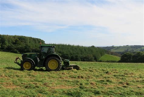 Mowing The Grass To Make Hay At Farm Bandb Devon Huxtable Farm