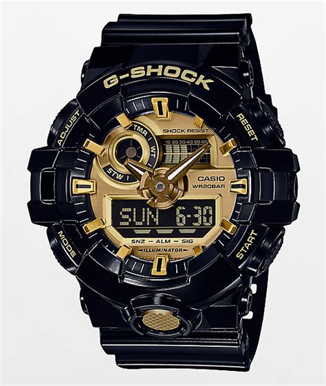 Made with a resin band, it is perfect to wear when you're outdoors. G-Shock GA710GB-1AG Black & Gold Watch | Zumiez