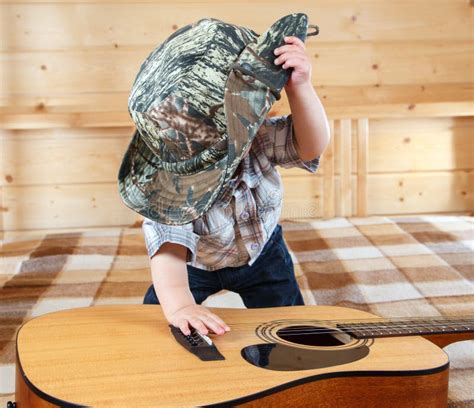 Boy With Cowboy Hat And Guitar Stock Photo Image Of Cowboy Closeup