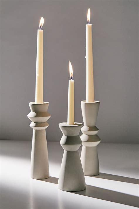 Cement Taper Candle Holder | Diy cement candle holders, Taper candle holders, Candle holders