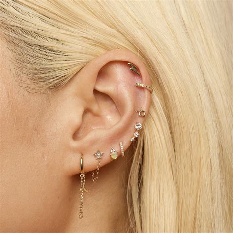 galaxy huggies in 2021 unique ear piercings pretty ear piercings ear jewelry