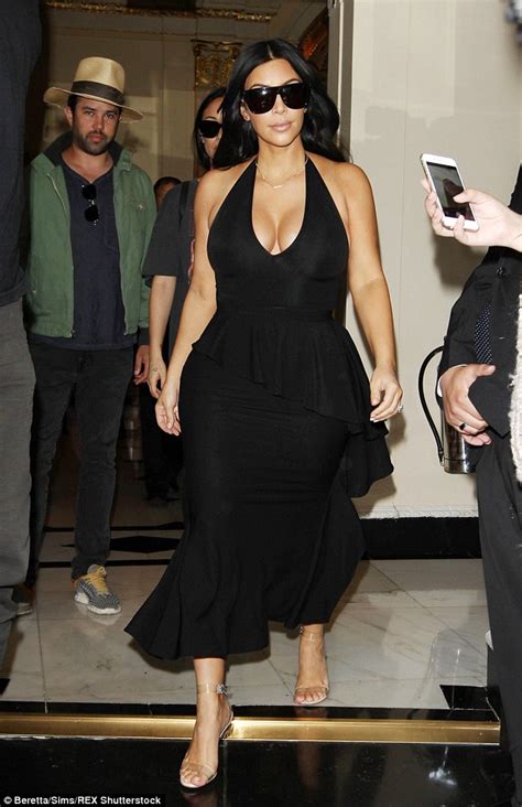 Kim Kardashian Shows Cleavage As She Leaves The Dorchester Hotel In