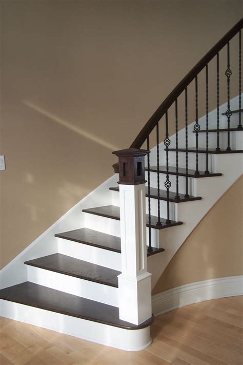 Brown iron and white wood staircase 3122. Long Twist Balusters & Baskets - House of Forgings | Stair ...