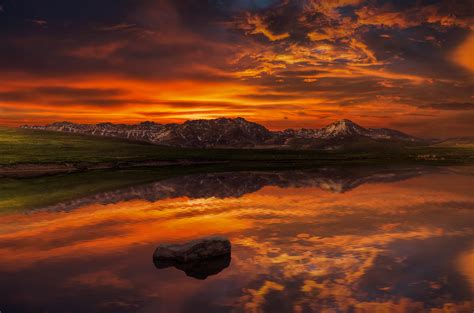 Body Of Water And Mountain During Sunset Hd Wallpaper Wallpaper Flare
