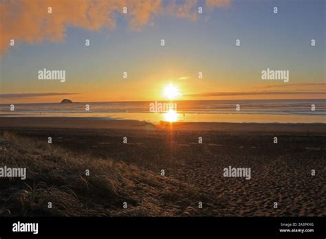 Romantic Sunset At Muriwai Beach Stock Photo Alamy