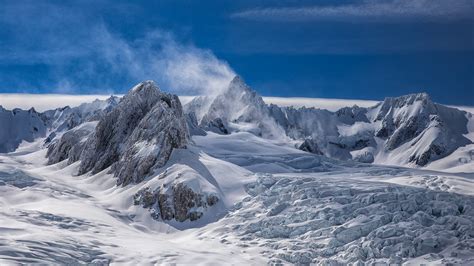 Download Wallpaper 1600x900 New Zealand Peaks White Snow Mountains