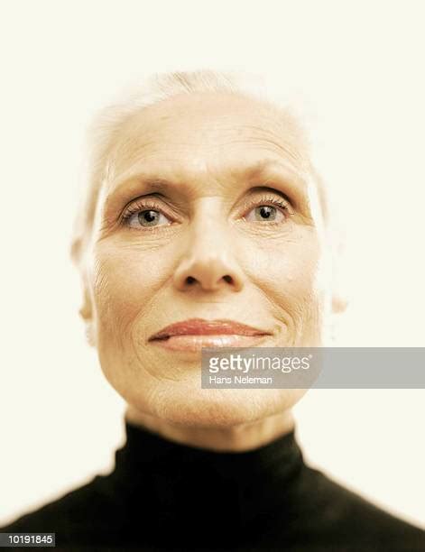 Mature Black Woman Wearing Turtleneck Photos And Premium High Res