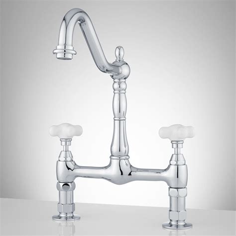 This parq kitchen faucet delivers a freshthis parq kitchen faucet delivers a fresh interpretation of the traditional bridge design, incorporating clean lines for ease of maintenance. Douglass Bridge Kitchen Faucet - Small Porcelain Cross ...