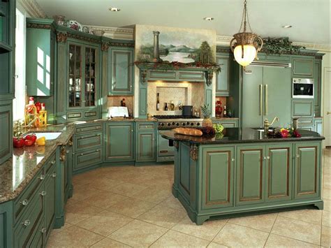 The detailing on the white cabinets make them very french chic, and. Green French country kitchen cabinets. | French country ...