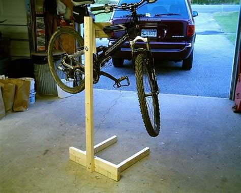 It works well for many of you who do not have a lot of garage space. diy bike stand - Google Search (With images) | Bike stand, Bike stand diy, Bike repair stand