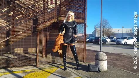 dana labo walk in leather mini dress shiny corsair boots very high heels and gloves and