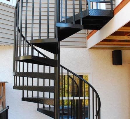 The stair flight can be equipped with protective paneling and a door with a panic bar or lock handle; Aluminum Spiral Staircase, Outdoor Aluminum Stair | Salter Spiral Stair
