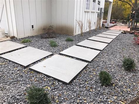 Poured Concrete Stepping Stones With Corten Steel Frame Concrete