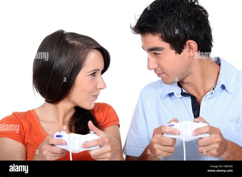 Two Young People Playing Computer Games Stock Photo Alamy