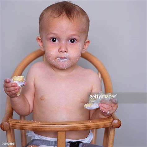 Eating Donut Messy Photos And Premium High Res Pictures Getty Images