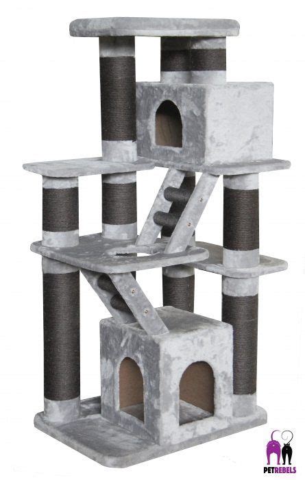 The Cat Tree Is Made Out Of Concrete And Has Two Levels To Climb Up It