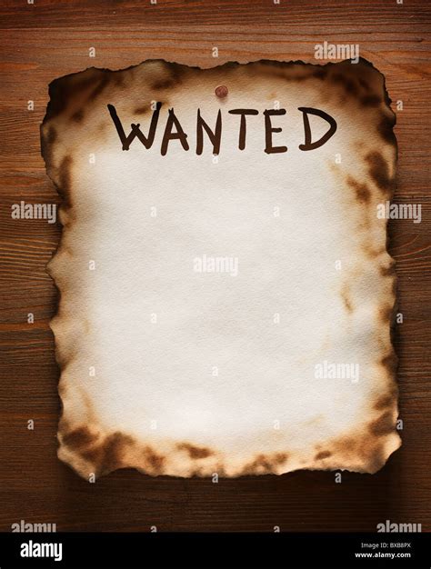 The Word Wanted Is Written On An Old Paper Texture On The Background