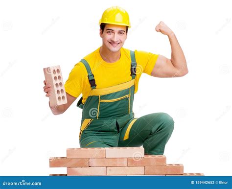 The Handsome Construction Worker Building Brick Wall Stock Photo