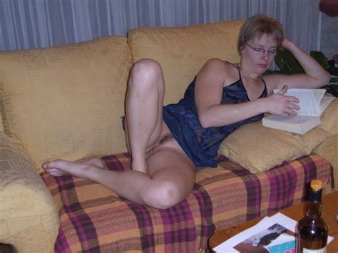 Claudine Reads Her Book With No Panties On Image 4 Of 7