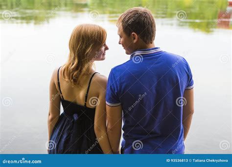Romantic Young Couple In Love Relaxing Outdoors In Park Stock Image
