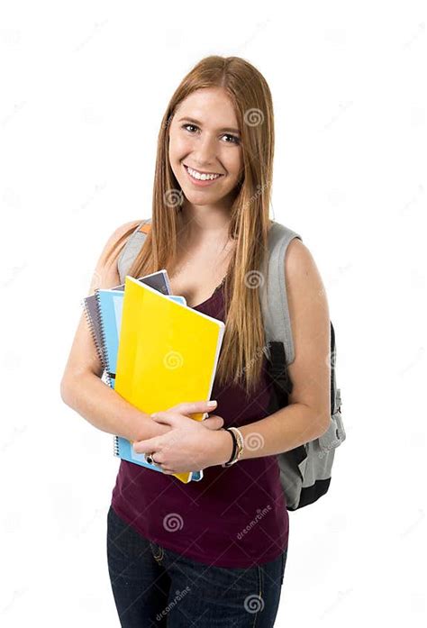 Young Beautiful College Student Girl Carrying Backpack And Books Posing