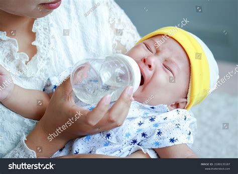 Baby Boy Cries Mother Feeds Her Stock Photo 2180135187 Shutterstock