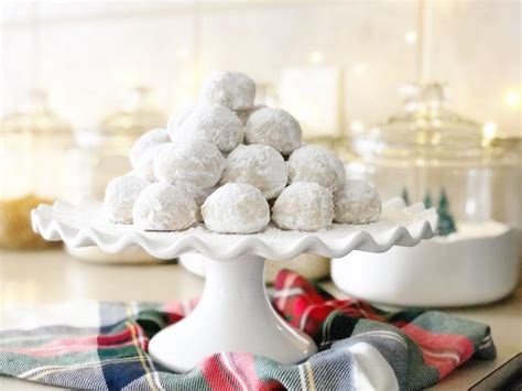 these snowball cookies melt in your mouth they re sweet buttery nutty and so delicious a