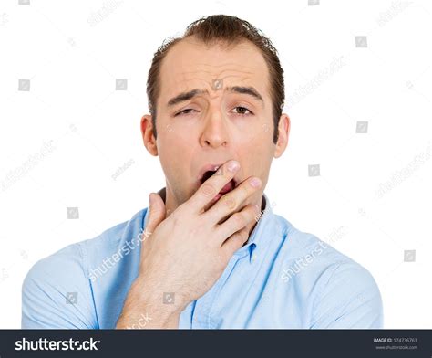 Closeup Portrait Of Sleepy Young Business Man Funny Guy Placing Hand