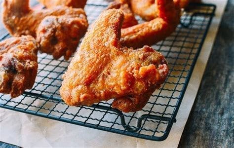 (if your stove runs hot, you might need to turn it down to medium.) add the canola oil to the skillet. Fried Chicken Wings, Chinese Takeout Style - The Woks of Life