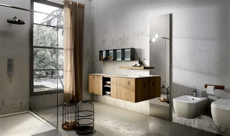 Le piastrelle effetto pietra mettono in risalto gli arredi e i sanitari bianchi in questo bagno dallo stile minimalista. Tende casa ultime tendenze