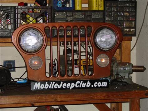Cj Grill On Wall With Lights Jeep Grill Automotive