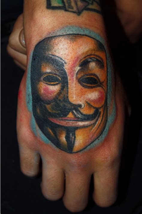 Mask Of V Hand Tattoo Tattoomagz › Tattoo Designs Ink Works